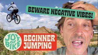 Jumping a mountain bike. Beginners, keep the vibes positive or else.