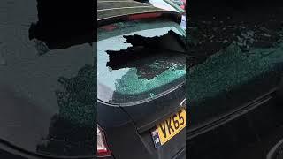 CARAVAN SMASHES CAR WINDOW