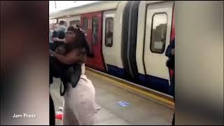 Fight breaks out at busy London tube station as shocked commuters look on