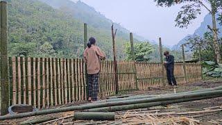 Homeless boy and poor build bamboo gate and bamboo fence, protect house