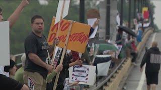 Twin Cities activists protest against ICE raids at Lake Street/Marshall Avenue Bridge