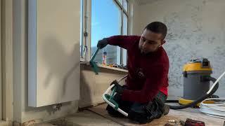 A plumber shows how to connect vertical radiators