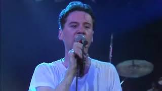 091-SIMPLE MINDS - The American (Live Dortmund 24-06-1984) (1981)