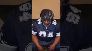 Cowboys fan distraught after losing in the first round to the Packers.