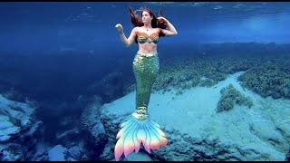 BEAUTIFUL MERMAID SWIMMING IN CRYSTAL CLEAR WATER