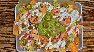 Loaded Cheesy Nachos with Shrimp and Guacamole in Miami! 
