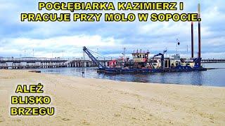 Pogłębiarka Kazimierz I pracuje przy molo w Sopocie.Trwa refulacja plaży w Sopocie.17.11.2024.