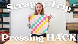 The simple trick for nested seams on a Scrappy Trip Around the World Quilt