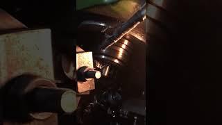 Retrofitting cnc lathe with part loader by Reco