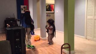 Myles Kingston age 2 rocking out with guitar to Heathen by Bob Marley