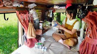 Minivan camping on a summer day.