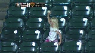 Fan gives souvenir foul ball to young girl