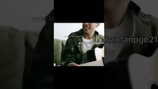 Aryan Khan playing the guitar