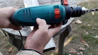 Hyundai d-850 Expert drill with key cartridge as it drills