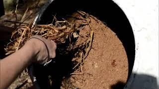 How to mix cob in a cement mixer - Adding the straw