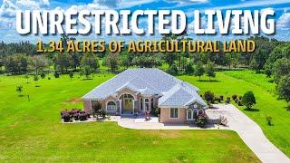 $200,000 PRICE REDUCTION on Florida Custom Pool Home With 1.34 Acres of AGRICULTURAL Land!