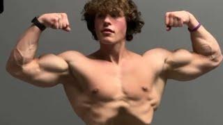 Handsome muscular teen boy showing off his muscles