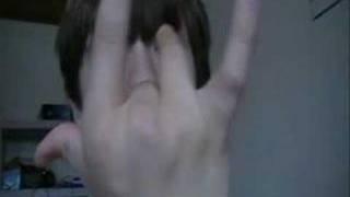Firmar his finger and pen