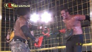 BLK Jeez tears up Sozio with a weed wacker | CZWstudios.com | Cage of Death 16