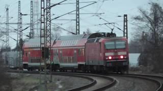 Ausfahrt einer DR Dosto Garnitur aus dem Bahnhof Halle-Rosengarten - mit BR 143