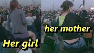 Riding on shoulders mom and girl!!