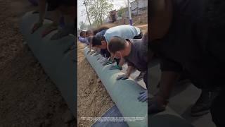 Cement blanket pond slope protection construction process