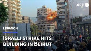 Moment Israeli strike hits building in Beirut's southern suburbs | AFP