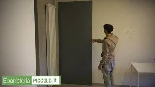 Porta scorrevole con binario invisibile