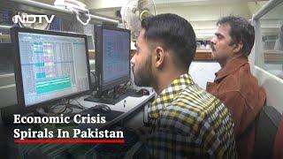 Pakistan's Rupee Plunges Amid Talks With IMF