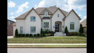 CUSTOM BUILT FRENCH TUDOR | 4 BR | 4.5 BA | GOLF COURSE LIVING | FOXLAND HARBOR |