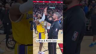 LeBron and K Love doing their handshake again 