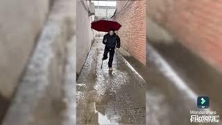 polio woman life Walking with crutches in the rain #disabled #polio