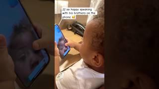 JJ so happy speaking with his brothers on the phone 