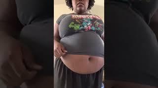 Belly in a shrunken t-shirt