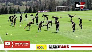 Kaizer Chiefs players warming-up and training