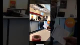 Racist white man hurl racist slurs at postal worker.
