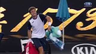 Pablo Carreno Busta madly throwing his bag and shouting at the Chair Umpire