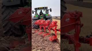 John Deere tractor with a Kuhn plough