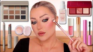 TRYING HOT NEW MAKEUP RELEASES | SKKN BY KIM THO… 