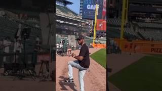 PAPOOSE SHOWS HOW HE PITCHES A BASEBALLL.....