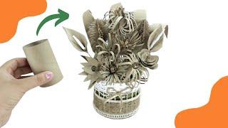 7 FLOWERS with ROLLS OF TOILET PAPER  (Arrangement or Bouquet with flowers in cardboard tubes)