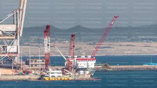 Aerial view of container cargo terminal of commercial port timelapse, business logistics and