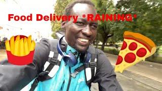 Wolt Food Delivery Courier on Košice Slovakia Delivers on a Rainy Day