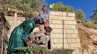 The unique art of a nomadic mother and a deaf man in building a bathroom for a shelter