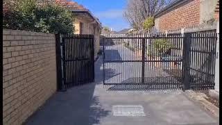 Combo Bi-fold Set with Programmed Pedestrian Mode - by The Motorised Gate Company