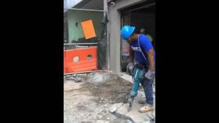 Concrete demolition using Makita Electric Jack Hammer