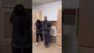 We created a mudroom in our garage using premade cabinets from Home Depot! #diy #homerenovation