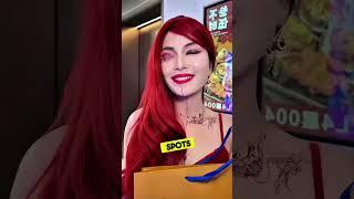 This Woman Shows up for a Looking Extra Flamboyant With Fiery Red Hair and a Fake Pregnant Belly