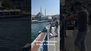 Fishing off the Galata Bridge in Istanbul