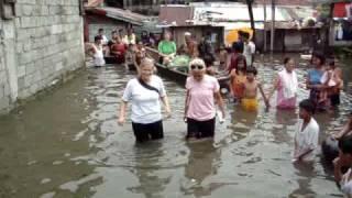 Katharina and Kristine walking in the flood water